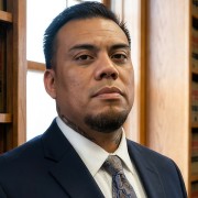 Man with short, spiky dark hair and goatee